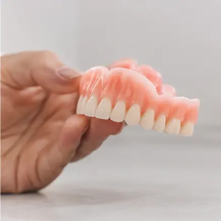 Prótese dentária de aparência natural